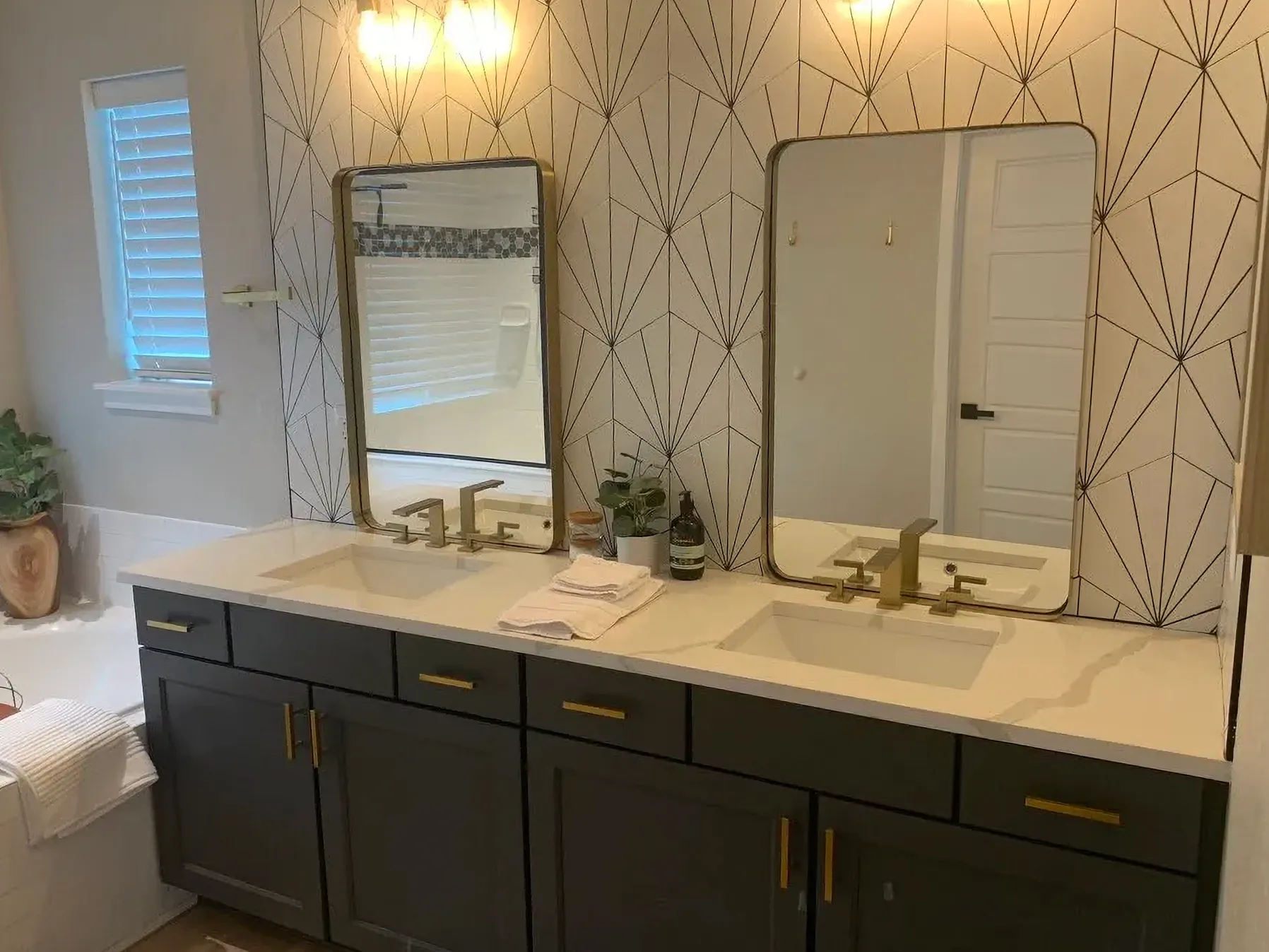 Luxury master bathroom with dual-sink white quartz vanity